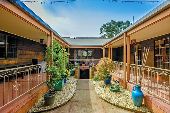 The castle on the hill 2 130 Monument Road Courtyard