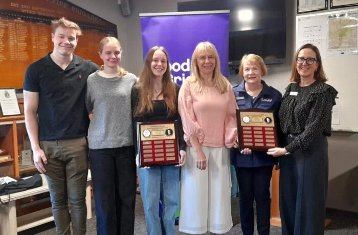 Greig Wanless family Will Matilda Alannah and Karen with Yarrambat CFA volunteer Sue Mountain and the Good Friday Appeals Claire ORiordan