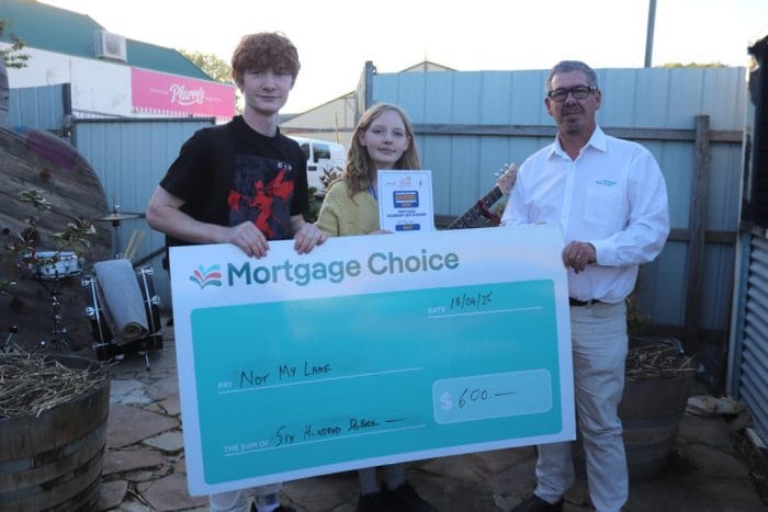 Busking Not my lane receive their prize money from Mortgage Choice 1 1